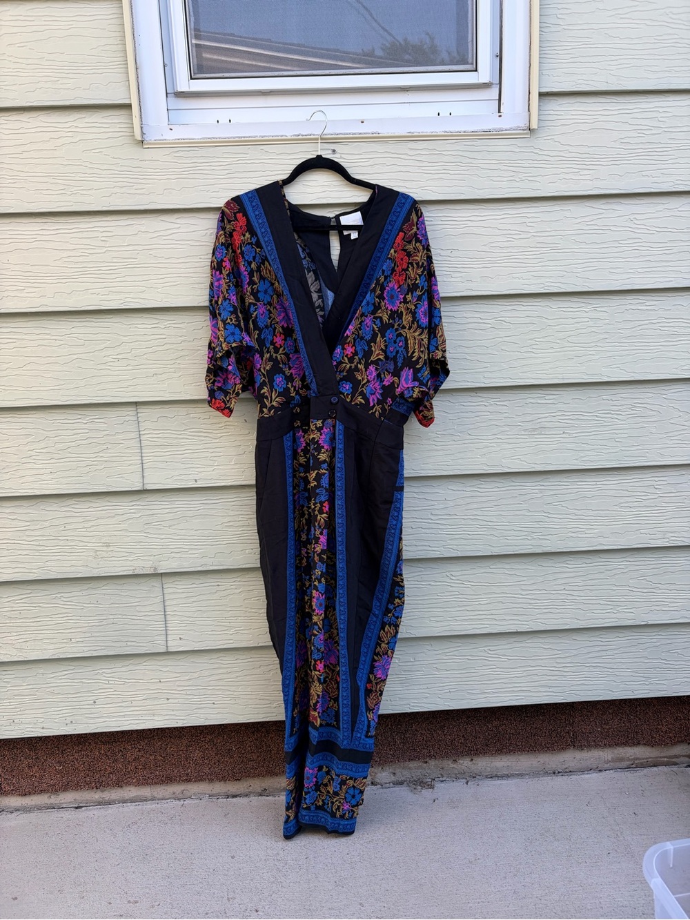 Anthropologie Black Floral Jumpsuit with Blue Trim